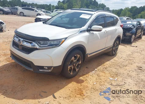 2017 Honda Cr-V Touring z USA, uszkodzony, nr VIN 5J6RW2H91HL068283
